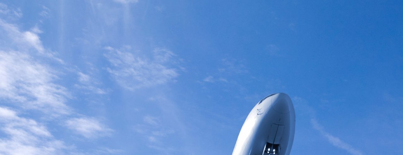 Boeing 767 jet aeroplane landing from bright summer sky. A conceptual look at air travel. More aircraft