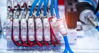 Pneumatic system consisting from hoses and valve controller.; Shutterstock ID 2461072887; purchase_order: Industrial Solutions (IS); job: Tech Article; client: Esther (IG Brand); other: .